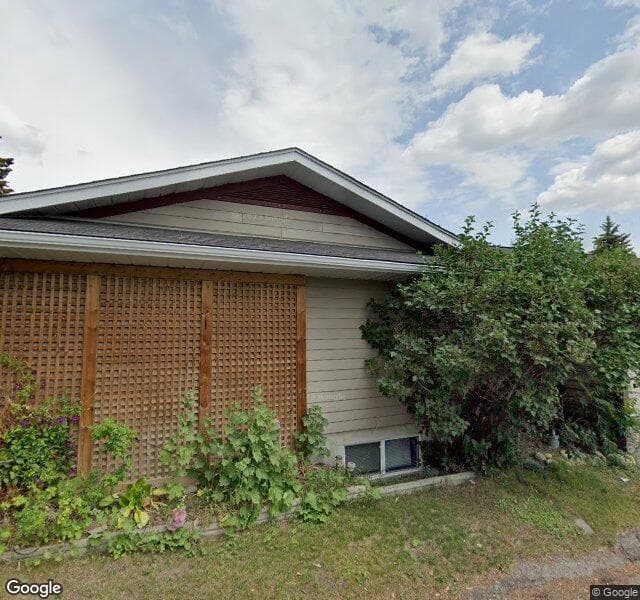 Street view of 12560 Lake Geneva Road SE, Calgary