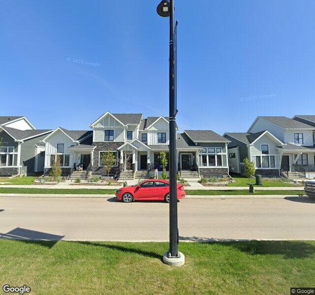 Street view of 1133 Creekside Boulevard SW, Calgary
