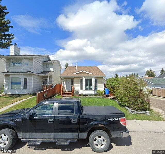 Street view of 159 Millcrest Way SW, Calgary