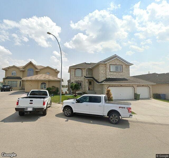 Street view of 216 Coral Shores Bay NE, Calgary