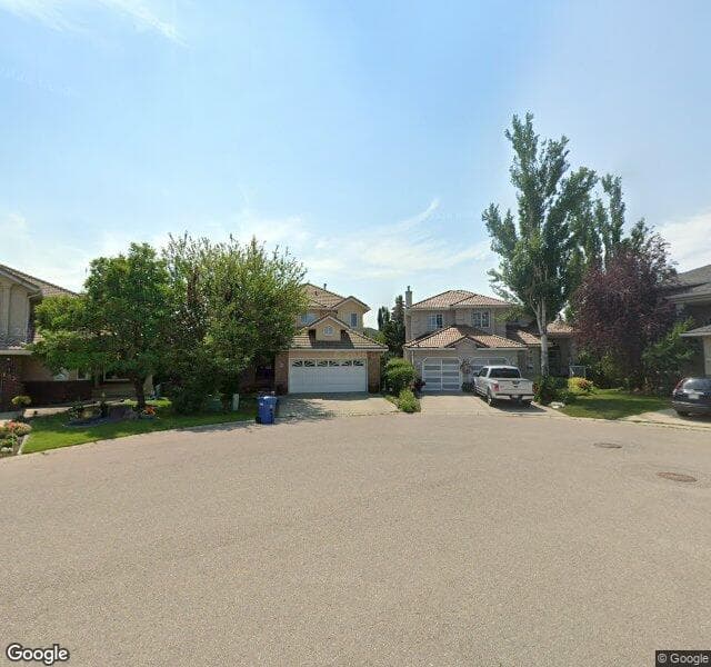 Street view of 131 Woodpark Bay SW, Calgary