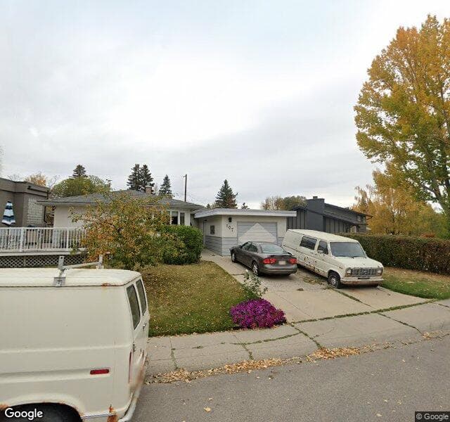 Street view of 107 Hallbrook Drive SW, Calgary