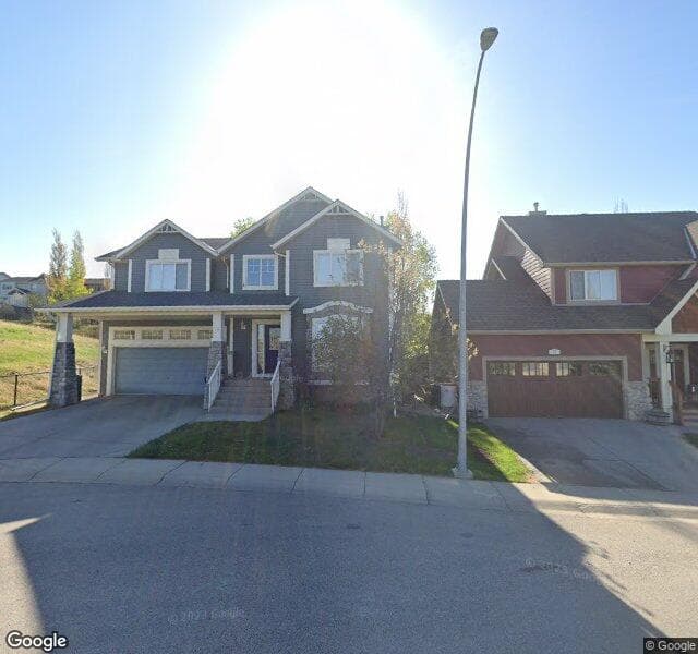 Street view of 16 Hidden Creek Crescent NW, Calgary