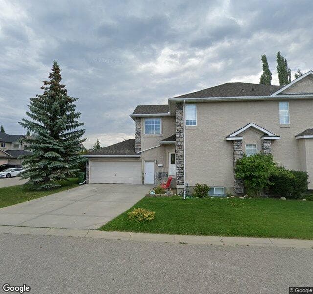 Street view of 27 Strathlea Close SW, Calgary