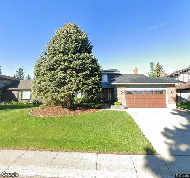 Street view of 2224 Lake Bonavista Drive SE, Calgary