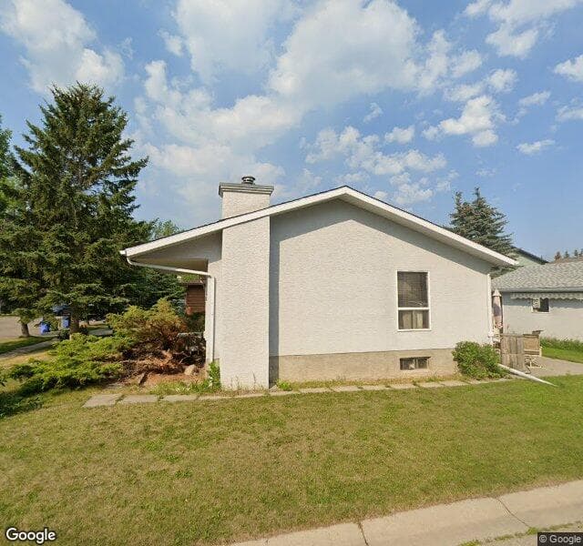 Street view of 216 Woodridge Drive SW, Calgary