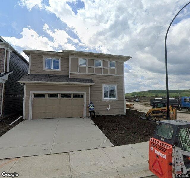 Street view of 166 Yorkstone Green SW, Calgary