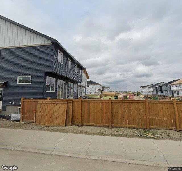 Street view of 16 Silver Spruce Bay SW, Calgary