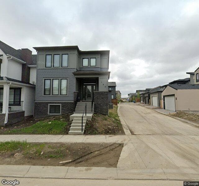 Street view of 106 Treeline Gardens SW, Calgary