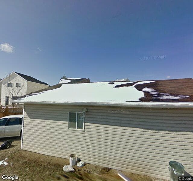 Street view of 135 Hidden Spring Mews NW, Calgary