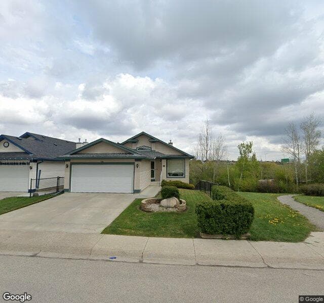 Street view of 113 Bridlecreek Park SW, Calgary