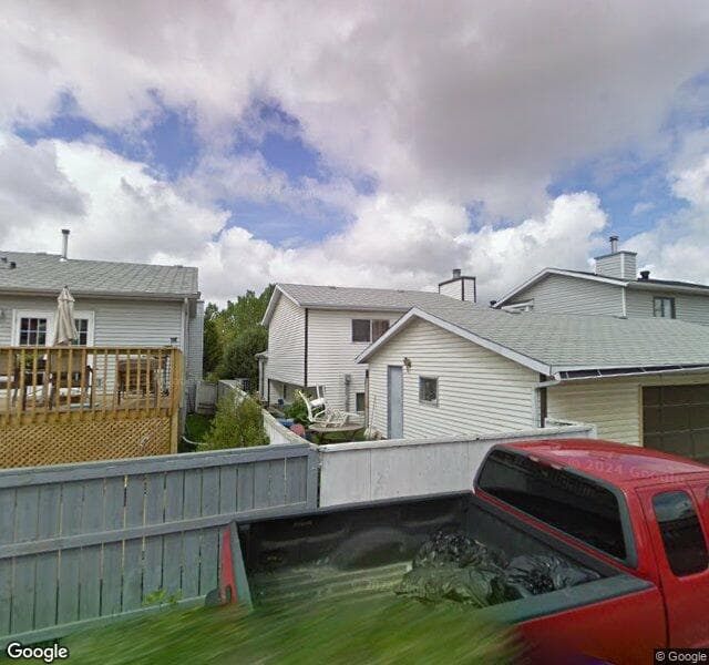 Street view of 96 Riverglen Way SE, Calgary