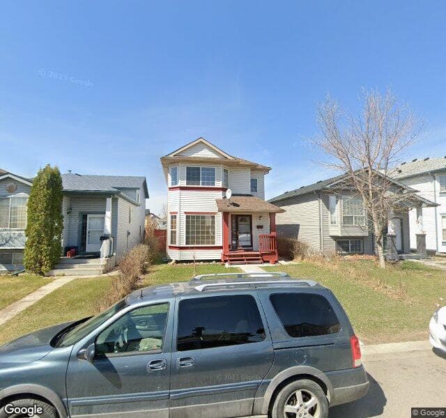Street view of 128 Martin Crossing Manor NE, Calgary