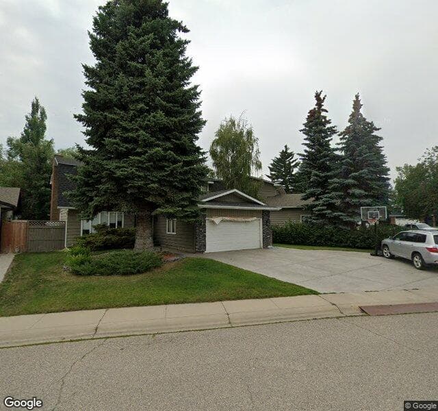 Street view of 107 Lake Mead Place SE, Calgary