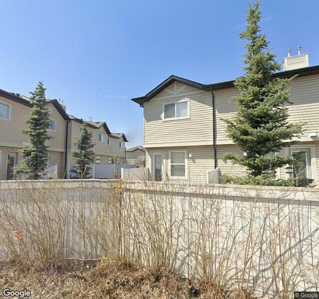Street view of 221 Saddlebrook Point NE, Calgary