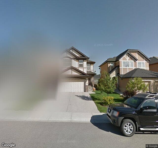 Street view of 130 Aspen Hills Way SW, Calgary
