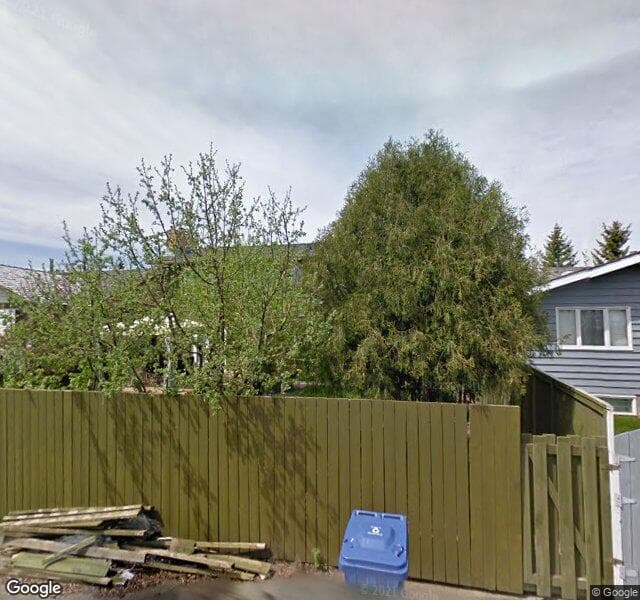 Street view of 147 Woodfern Place SW, Calgary