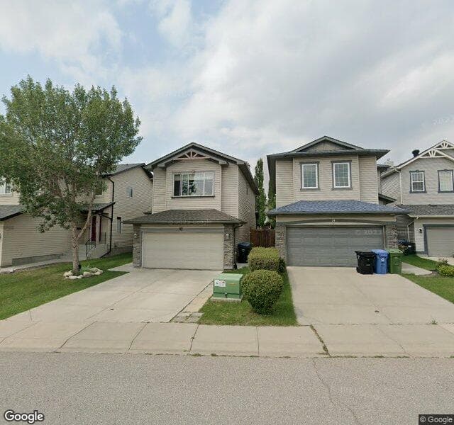 Street view of 10 Tuscany Ravine Manor NW, Calgary