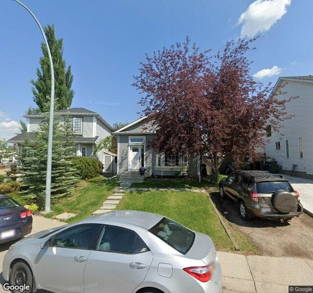 Street view of 98 River Rock Way SE, Calgary