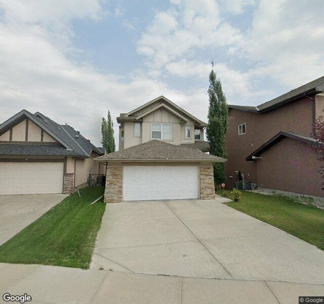 Street view of 338 Tuscany Ravine Road NW, Calgary