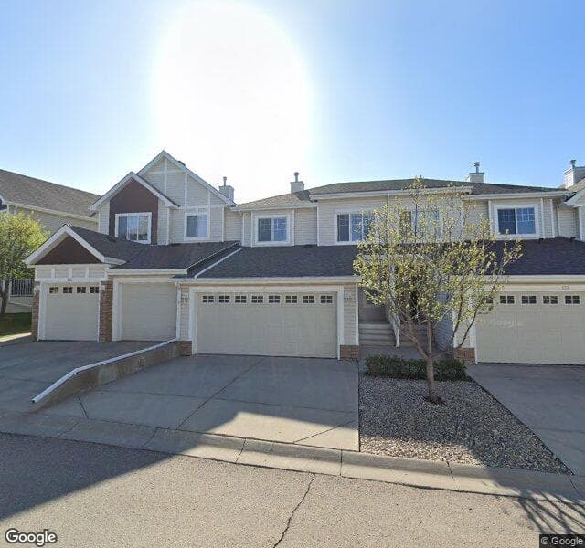 Street view of 135 Hidden Creek Gardens NW, Calgary