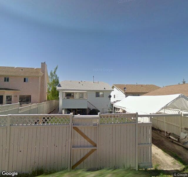 Street view of 16242 Shawbrooke Drive SW, Calgary