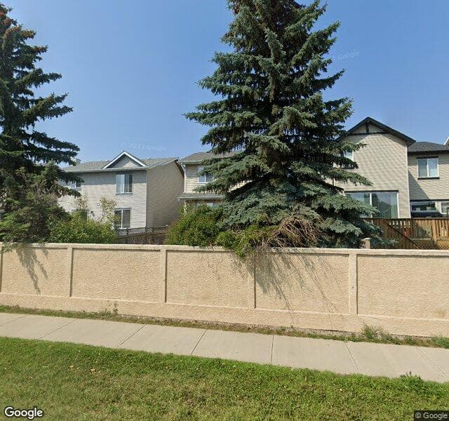 Street view of 310 Cougarstone Circle SW, Calgary