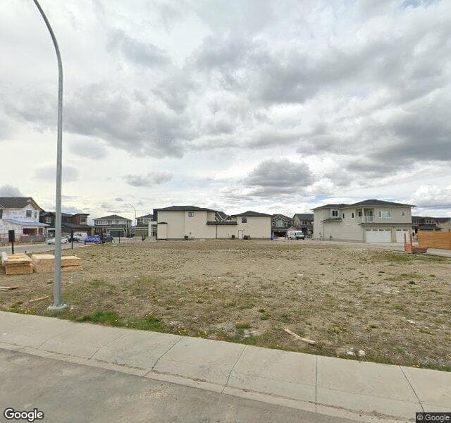 Street view of 87 Rock Lake View NW, Calgary