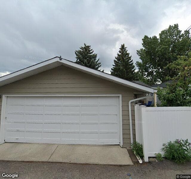 Street view of 1115 Lake Wapta Way SE, Calgary