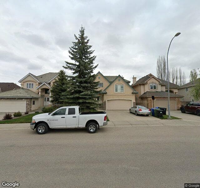 Street view of 1725 Evergreen Drive SW, Calgary
