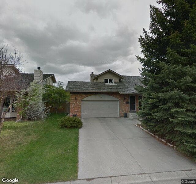 Street view of 16 Woodgreen Crescent SW, Calgary