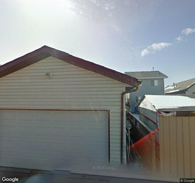 Street view of 18 Hidden Spring Green NW, Calgary