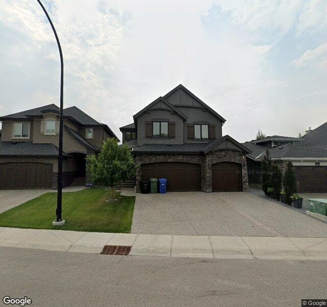 Street view of 111 Cranbrook Way SE, Calgary