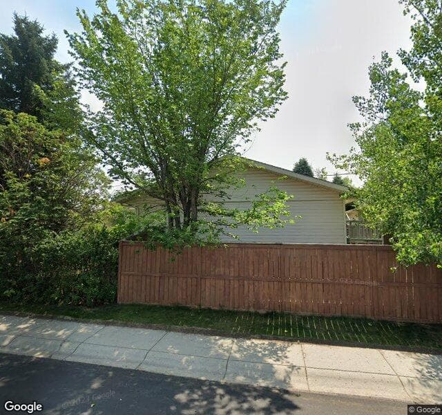 Street view of 223 Woodside Circle SW, Calgary