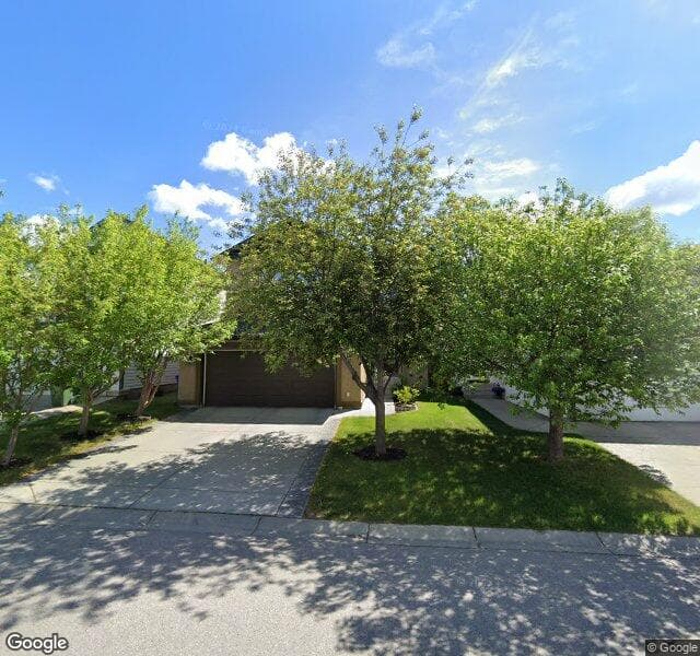 Street view of 132 Tuscany Meadows Common NW, Calgary