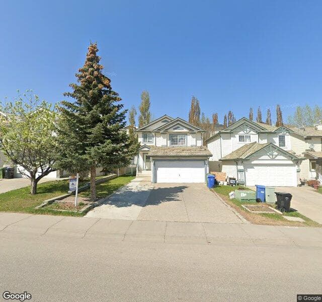 Street view of 348 Harvest Hills Drive NE, Calgary