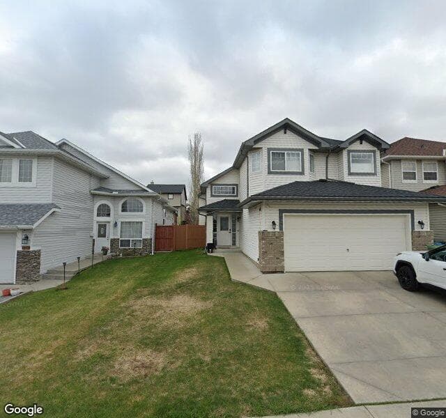 Street view of 128 Everhollow Way SW, Calgary