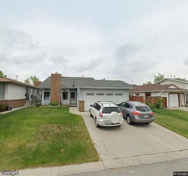 Street view of 23 Woodfield Crescent SW, Calgary