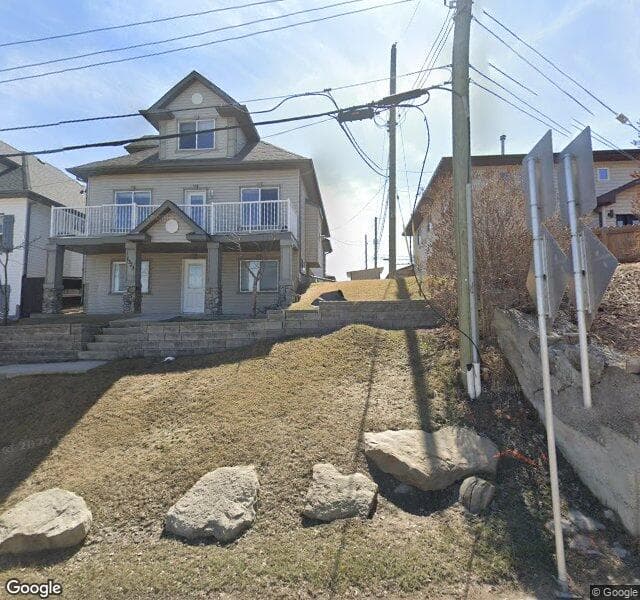 Street view of 1323 8 Avenue NE, Calgary