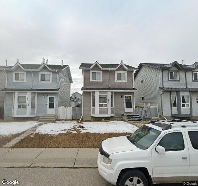 Street view of 120 Rivercrest Close SE, Calgary
