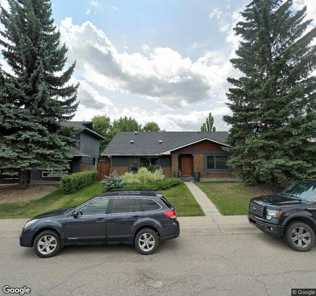 Street view of 1562 Lake Bonavista Drive SE, Calgary