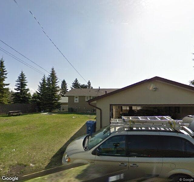 Street view of 1048 Hunterdale Place NW, Calgary