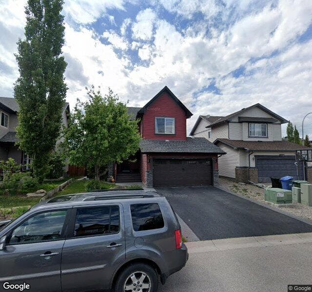 Street view of 140 Hidden Creek Circle NW, Calgary