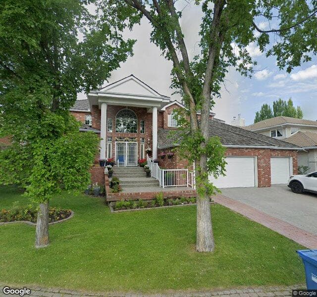 Street view of 135 Woodacres Drive SW, Calgary