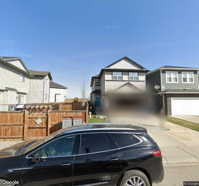 Street view of 151 Covecreek Place NE, Calgary