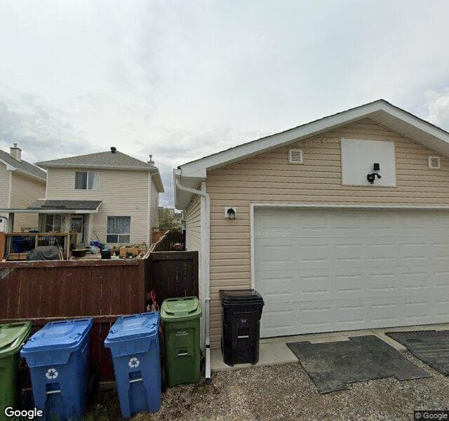 Street view of 220 Bridlewood Avenue SW, Calgary