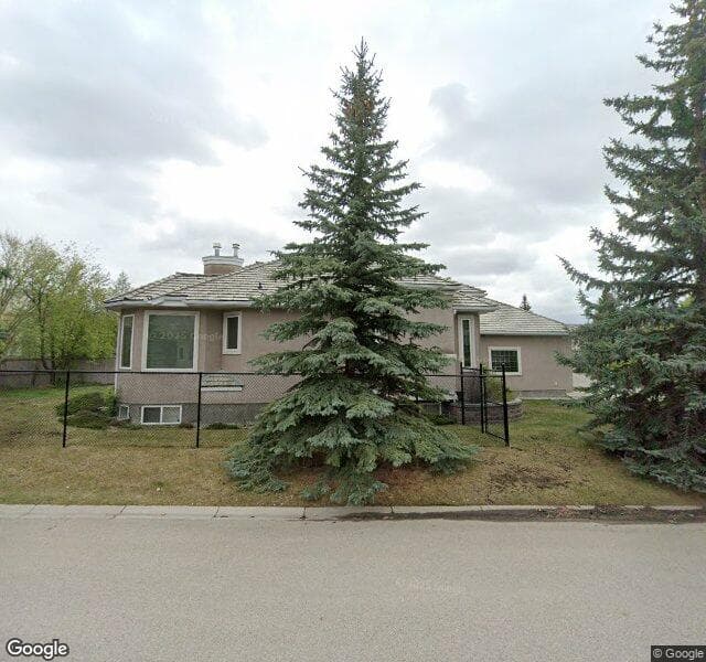 Street view of 1709 Evergreen Drive SW, Calgary