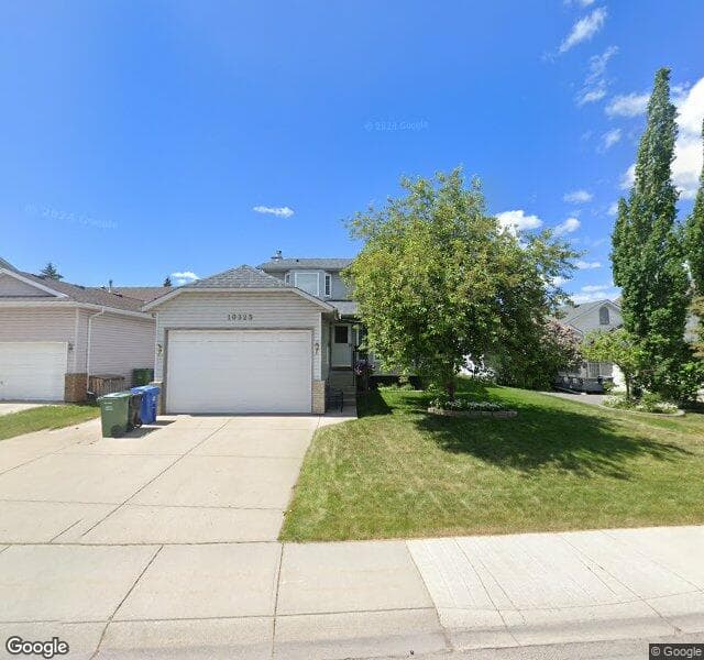 Street view of 10325 Hidden Valley Drive NW, Calgary