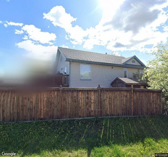 Street view of 304 Somerside Close SW, Calgary