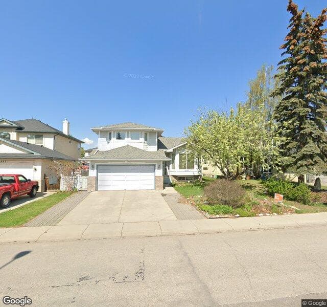 Street view of 10947 Harvest Lake Way NE, Calgary